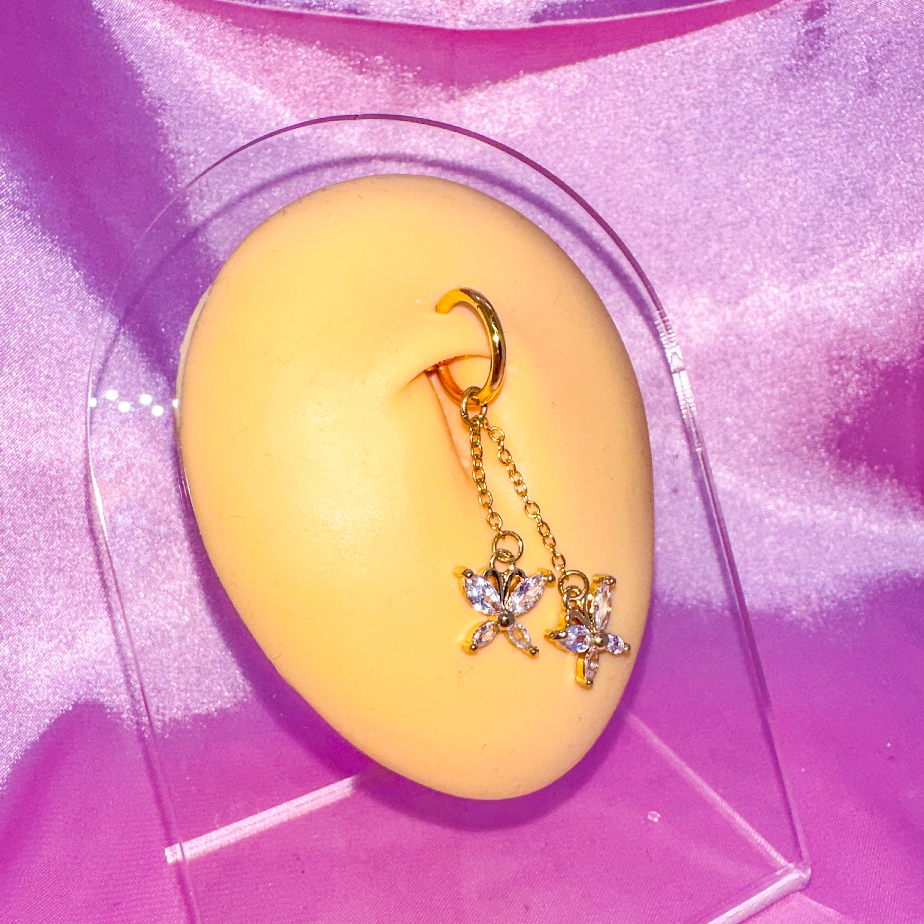 Faux piercing au ventre scintillant